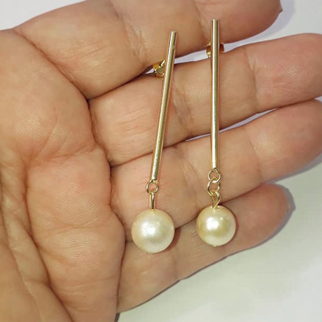 Brinco grande banhado com bola pérola