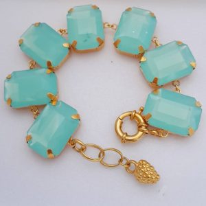 Pulseira Dourada Feminina com Chatons – Estilo e Sofisticação