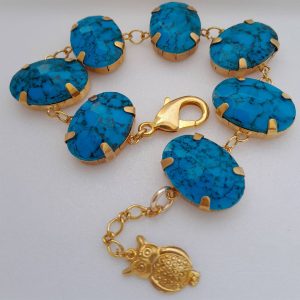 Pulseira Feminina Dourada com Chatons – Estilo e Sofisticação